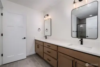 Upstairs primary bathroom - Pics are of a different 3049 plan. Features and colors may differ