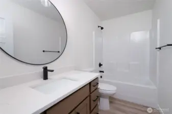 Upstairs guest bathroom - Pics are of a different 3049 plan. Features and colors may differ.