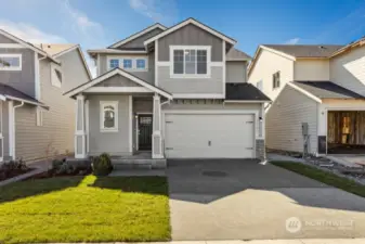 **Photos of simlar floorplan in another community. Features and specs will vary**