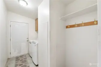 utility room off between the kitchen & garage