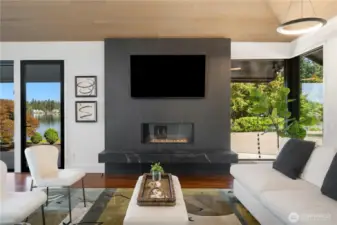 The inside is equally impressive! One of the 4 fireplaces in this home, slathered in slabs of Dekton. This is the living room just off the entrance.