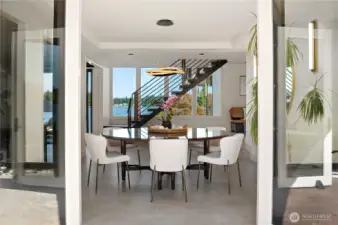 Dining room from one of the many exterior patios. Imagine breaking bread with this incredible view!