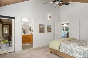 This is one of the upstairs bedrooms that has vaulted ceilings, it’s own 3/4 bath, and shares a deck for morning coffee if you like, of course all while enjoying the Pointe at Lake Sawyer views.