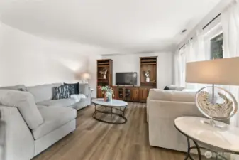 Spacious living room with new luxury vinyl flooring