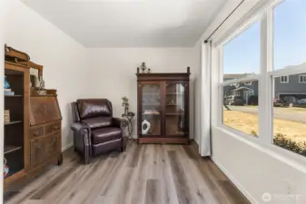 This extra finished room on the main floor is off the entry could be home office, 5th bedroom or play area