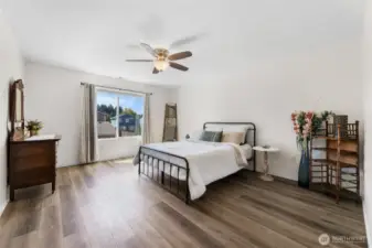 Primary bedroom with walk-in closet and bath