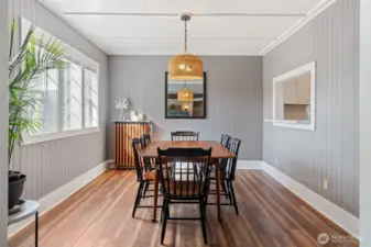 Formal dining room filled with natural light—perfect for gatherings.