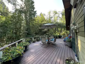Deck overlooking the side of the property.