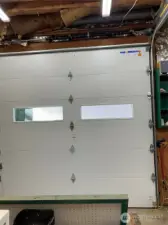 The very large garage has tall doors for RV access