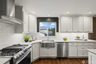Ceiling-height custom cabinets with crown moulding are elegant and so much storage!