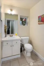 Convenient guest powder room off main living area.
