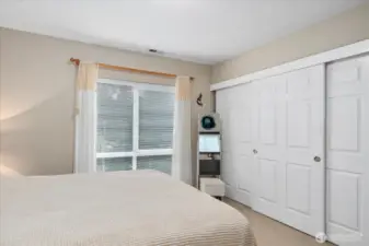 Wall-to-wall closets and large picture window for natural light.