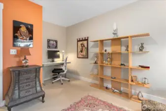 2nd bedroom with a desk space.