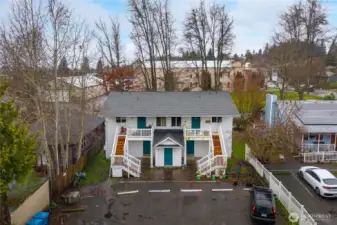 Better view to detail the parking in back, off the alley.