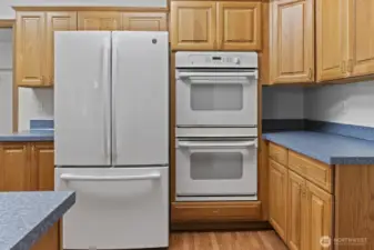 More cabinet and counter space next to the double oven.