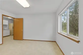 Here is the flex room off of the laundry room and next to a 3/4 bath.