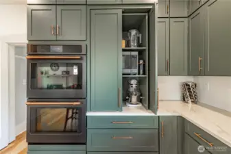 Appliance cabinet for easy access and storage.