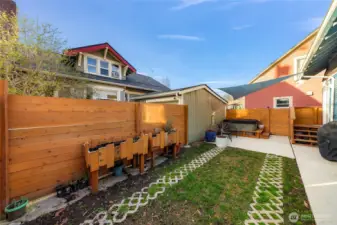 Patio, BBQ, raised beds for the green thumb and so much more in a minimalist space for low maintenance.