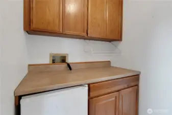 More kitchen cabinets and extra mini fridge