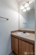 Powder room off of utility room