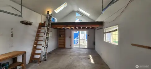 Rear garage loft and self closing slider