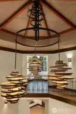 Dramatic, custom crafted chandelier commands your attention in the rotunda.