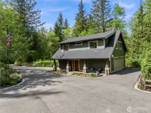 1200 sf DADU with 1080 sf MIL upstairs.  The covered porch has a private entrance to the MIL, a separate man door to the shop space and a utility sink.  Note the second set of double garage doors for drive through convenience.  Perfect for the hobbyist, artist or car enthusiast.