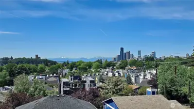 Unobstructed panoramic views of the Olympic Mountains, Lake Washington, and the Seattle skyline from every level of the home