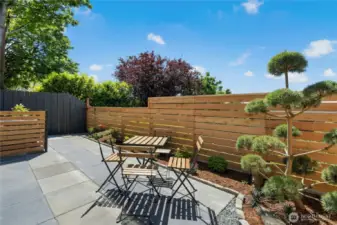 Backyard: new cedar fencing, paved side yards, and a tranquil zen garden