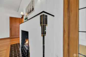 Fireplace details include original gold brass & black tiles.