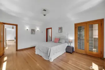 Huge primary bedroom with historical touches.