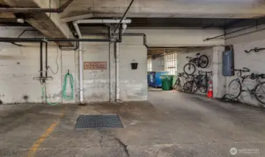 Car wash and bike storage in garage.