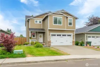 Wave to your nice neighbors from your covered porch