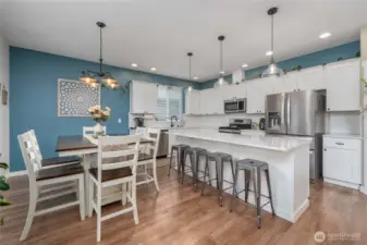 Large enough space for a dining room table AND seating at the large island counter