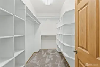 Spacious primary suite walk-in closet