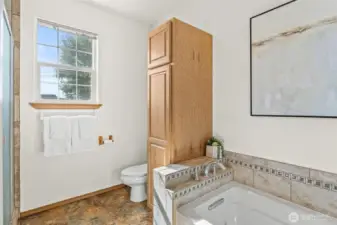 Bathroom two also features separate tub and shower enclosure
