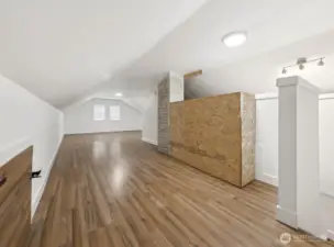 attic loft where you can create a large walk-in closet or a fourth bedroom