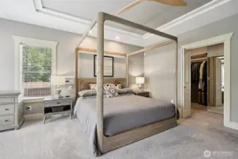Main-floor retreat with double fireplace and spa-inspired ensuite