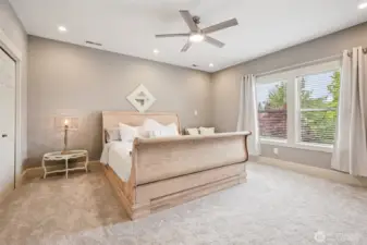 large walkin closet overlooking the back yard