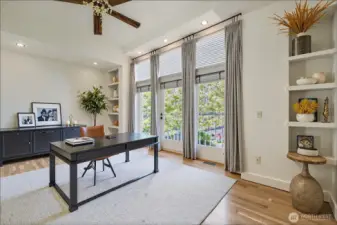 Bedroom 3 or Office den with high ceilings and fan.