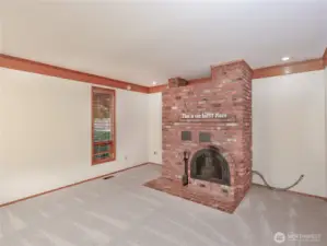 This Russian Fireplace is AMAZING! Pellets are fed thru garage.. Heats the Main floor w/ Ease!