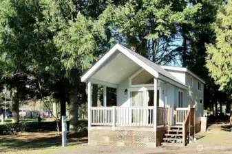 Covered front porch and entrance to home