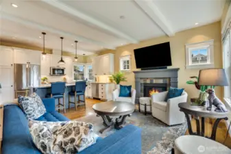 A seamless transition from the living room to the kitchen highlights the home’s thoughtful open-concept design.