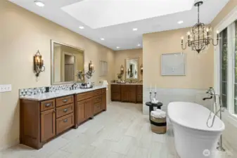 Heated floors. Shower & toilet to right of back wall sink.