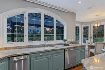 Electric Hunter Douglas blinds throughout the entire home.