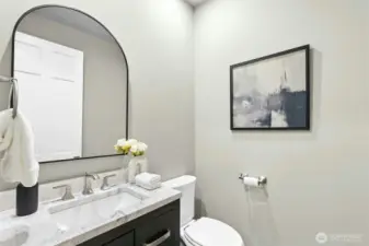 1 of 2 main floor powder rooms.