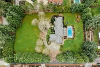 Professionally landscaped w/multi-zone RainBird system. 50-year Presidential roof.