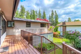 The easy maintenance deck offers a territorial view of your private backyard.