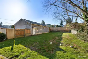 Fenced for play, gardening, furry friends...