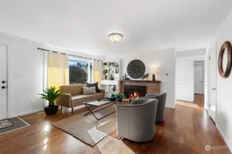 This shot shows the size of the living room well plus the hallway to bath and bedrooms.